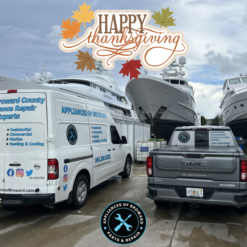 Happy Thanksgiving graphic above Appliances of Broward service vehicles in marina setting, featuring a white van and gray truck with logos, surrounded by yachts, emphasizing marine appliance repair services in Broward County.