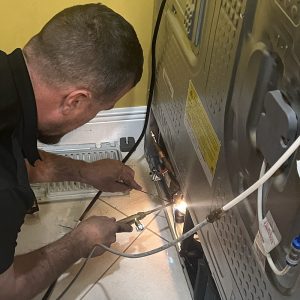 Servicing the Compressor on a Refrigerator in Broward County